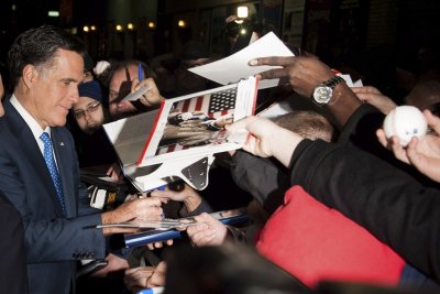 Mitt Romney signing autographs